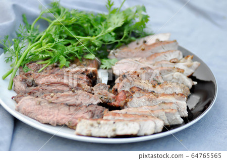 grilled pork , pork steak and beef steak 64765565