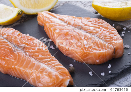 Two fresh raw salmon butterfly steaks 64765656
