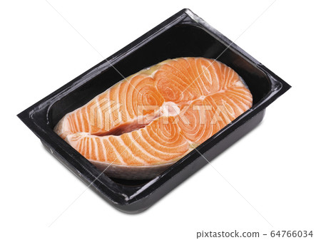One fresh raw Norwegian salmon steak in a black 64766034