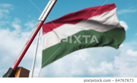 Open boom gate with QUARANTINE sign on the Hungarian flag background. Lockdown end in Hungary. 3D rendering 64767673