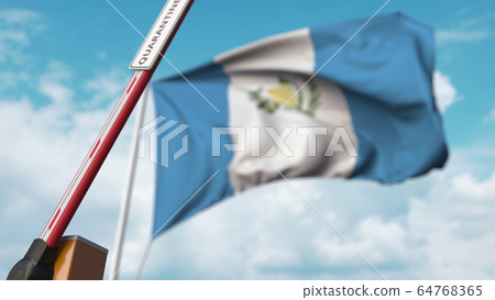 Barrier gate with QUARANTINE sign being open with flag of Guatemala as a background. Guatemalan Lockdown end. 3D rendering Barrier gate with QUARANTINE sign being open with flag of Guatemala as a background. Guatemalan Lockdown end. 3D rendering 64768365