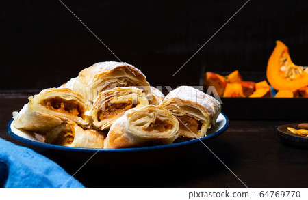 Homemade Pumpkin pie covered with sugar Homemade Pumpkin pie covered with sugar 64769770