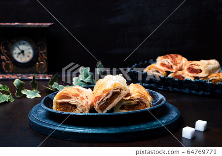 Pumpkin pie with sugar on a plate Pumpkin pie with sugar on a plate 64769771
