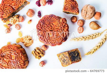 Traditional Chinese moon cakes and walnut raisin 64769773