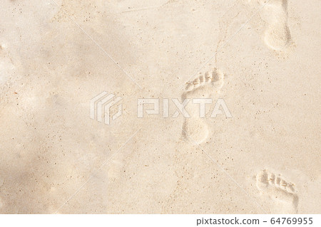 design base set of footprints on beige sand go up design base set of footprints on beige sand go up 64769955