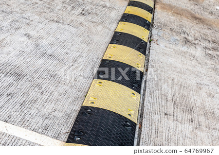 striped black and yellow artificial road striped black and yellow artificial road 64769967