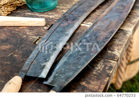 pair of sharp hand tools for removing bark from a 64770253