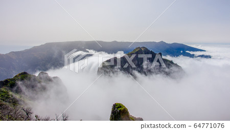 Madeira mountain landscape spectacular view clouds roller wave horizon blue sky outdoor traveling concept encumeada pass 64771076