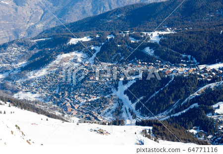 city of Courchevel view mood sunset with snowy mountain landscape France alpes  64771116