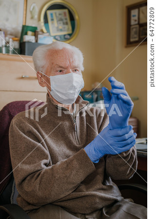 Old man wearing protective mask and gloves 64772809