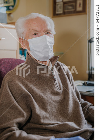 Old man wearing protective mask and gloves 64772811