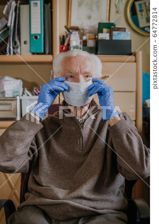 Old man wearing protective mask and gloves 64772814
