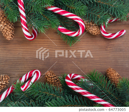 Christmas tree branch decorated with garlands, Christmas tree branch decorated with garlands, 64773005