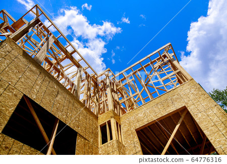 Framing beam of new house under construction wood Framing beam of new house under construction wood 64776316