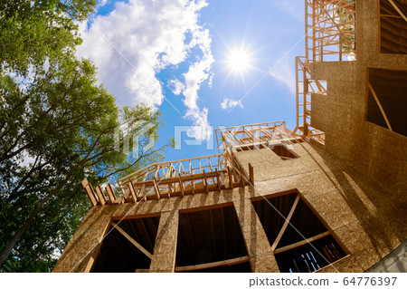 New construction of a house framed of a under 64776397