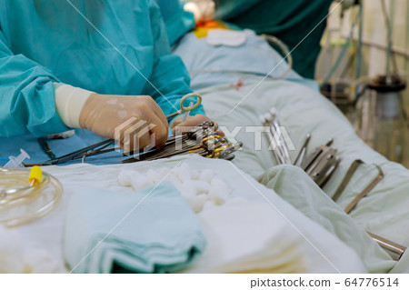 Operating room ready for operation nurse preparing Operating room ready for operation nurse preparing 64776514