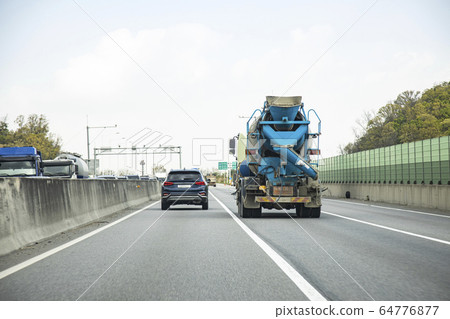 Remicon truck on the highway Remicon truck on the highway 64776877
