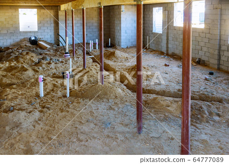 Installing sewer pipe in the ground basement Installing sewer pipe in the ground basement 64777089