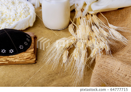 Traditional Shavuot Jewish holiday dairy products 64777715