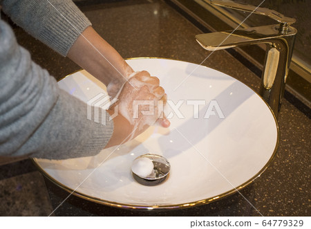 Hand washing Hand washing 64779329