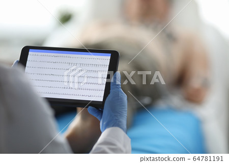 Doctor wearing protective gloves Doctor wearing protective gloves 64781191