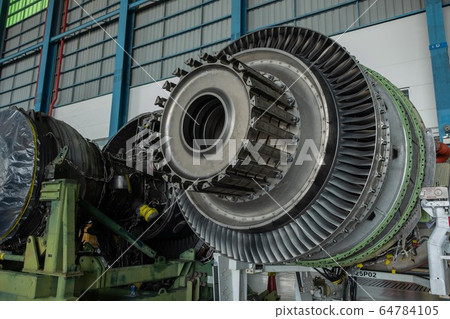 Gas turbine or a jet engine is a power plant of aircraft to fly in the air.Disassembly engine during repair and maintenance. 64784105
