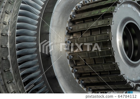 Gas turbine or a jet engine is a power plant of aircraft to fly in the air.Disassembly engine during repair and maintenance. Gas turbine or a jet engine is a power plant of aircraft to fly in the air.Disassembly engine during repair and maintenance. 64784112