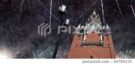 The Spasskaya Tower and fireworks in honor of Victory Day celebration (WWII), Red Square, Moscow, Russia The Spasskaya Tower and fireworks in honor of Victory Day celebration (WWII), Red Square, Moscow, Russia 64784220