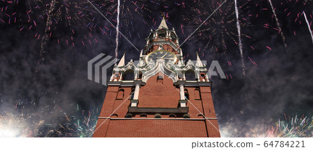 The Spasskaya Tower and fireworks in honor of Victory Day celebration (WWII), Red Square, Moscow, Russia The Spasskaya Tower and fireworks in honor of Victory Day celebration (WWII), Red Square, Moscow, Russia 64784221