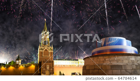 Moscow Kremlin and fireworks in honor of Victory Day celebration (WWII), Red Square, Moscow, Russia. Moscow Kremlin and fireworks in honor of Victory Day celebration (WWII), Red Square, Moscow, Russia. 64784614