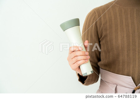 Woman with a flashlight 64788119