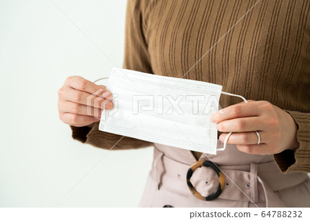 A woman with a mask A woman with a mask 64788232