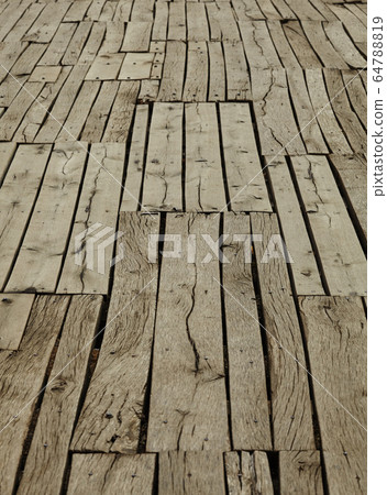Old dry and cracked wooden floor. 64788819