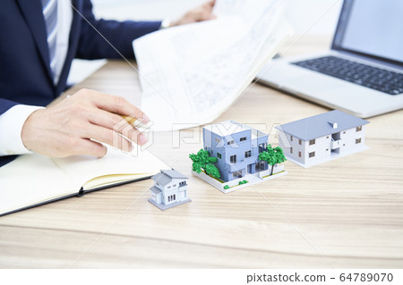 Businessman real estate agent 64789070