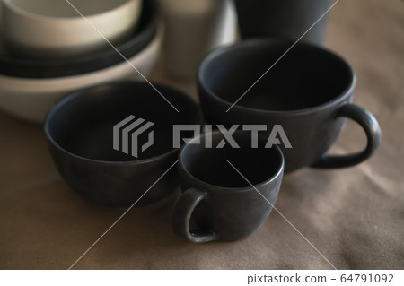 Matt ceramic handmade tableware in a workshop closeup Matt ceramic handmade tableware in a workshop closeup 64791092