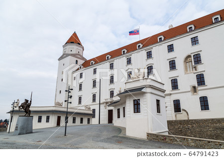 Flag above Bratislava Castle Flag above Bratislava Castle 64791423