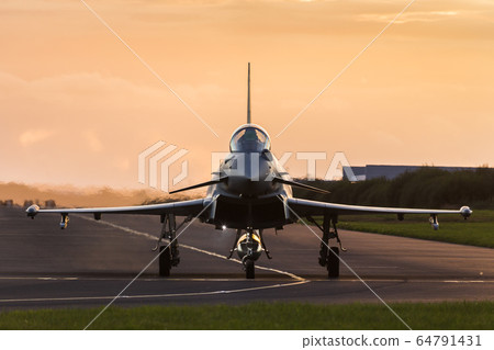 RAF Typhoon taxis out at sunset RAF Typhoon taxis out at sunset 64791431