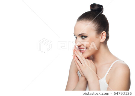 Attractive woman with clear healthy skin smiling. Attractive woman with clear healthy skin smiling. 64793126