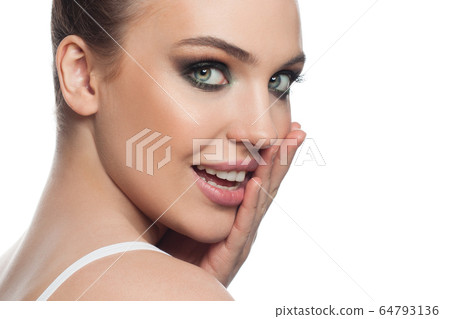 Cheerful female face close up portrait.  64793136