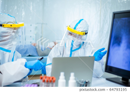 Scientists Studying Xray Of Lung 64793195