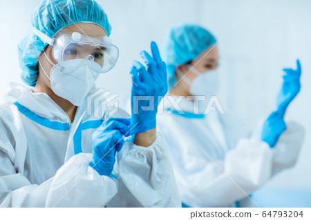 doctors wear protective suits doctors wear protective suits 64793204