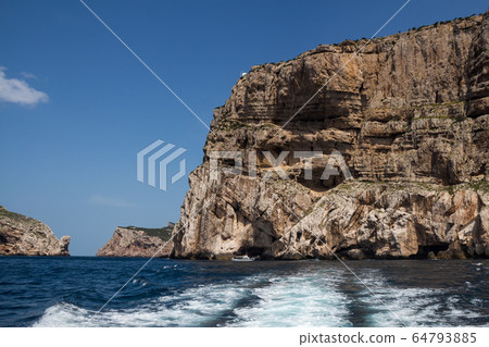 Cliffs and island Isola Foradada, Sardinia 64793885