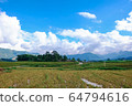 The beautiful landscape of Y Ty with mountains, clouds, blue sky, and rice fields, the most popular destination in Sapa, Vietnam. Royalty high-quality stock image of a landscape. The beautiful landscape of Y Ty with mountains, clouds, blue sky, and rice fields, the most popular destination in Sapa, Vietnam. Royalty high-quality stock image of a landscape. 64794616