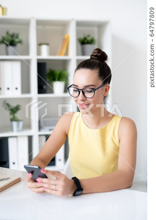Surfing social media during break 64797809