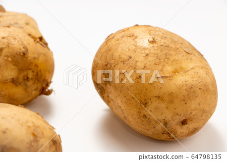 New potato (white background). New potato (white background). 64798135
