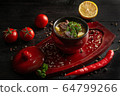 vegetable stew with potatoes and meat in a pot on a dark wooden background 64799266