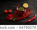 vegetable stew with potatoes and meat in a pot on a dark wooden background 64799270