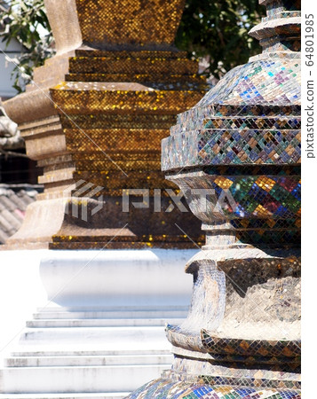 Decorative elements with meaningful buddhism ornaments in WAT XIENG THONG: the famous outstanding beautiful XIENGTHONG Temple in LUANG PRABANG province ex-capital city world cultural heritage in LAOS 64801985