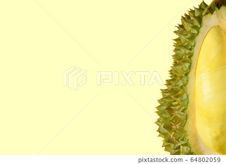 Fresh cut durian (monthong) on light yellow 64802059