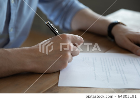 Close up businessman signing contract, legal documents with pen Close up businessman signing contract, legal documents with pen 64803191